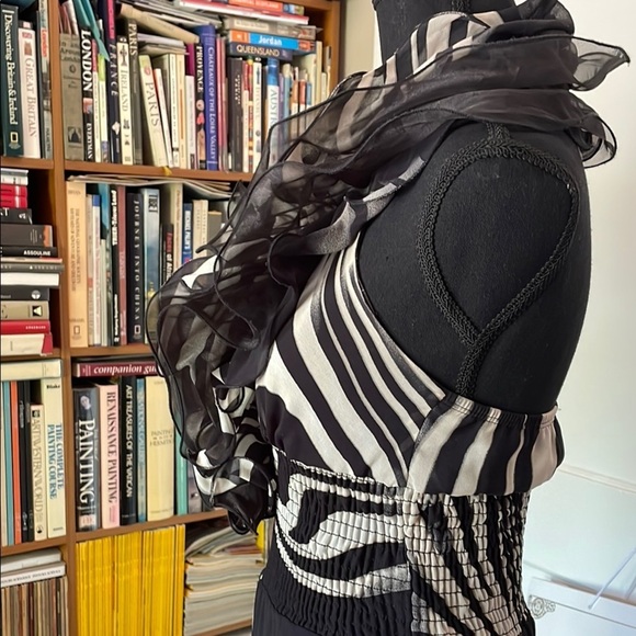 Elegant Black and White Halter-Top Jumpsuit with Ruffled Detail - Picture 7 of 16